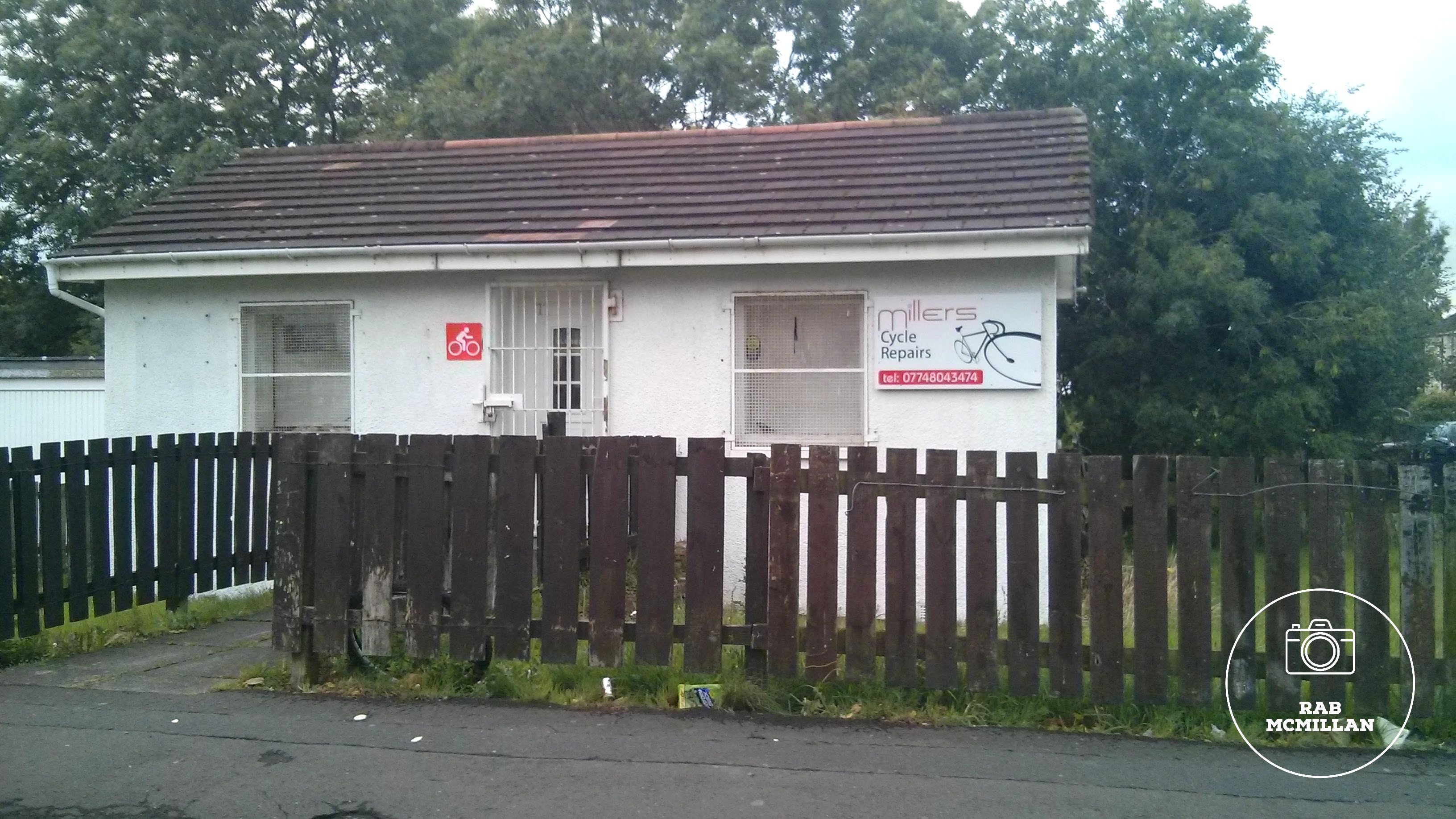 Millers Cycle Repairs, Glencairn Avenue, Craigneuk, Wishaw, 2015.