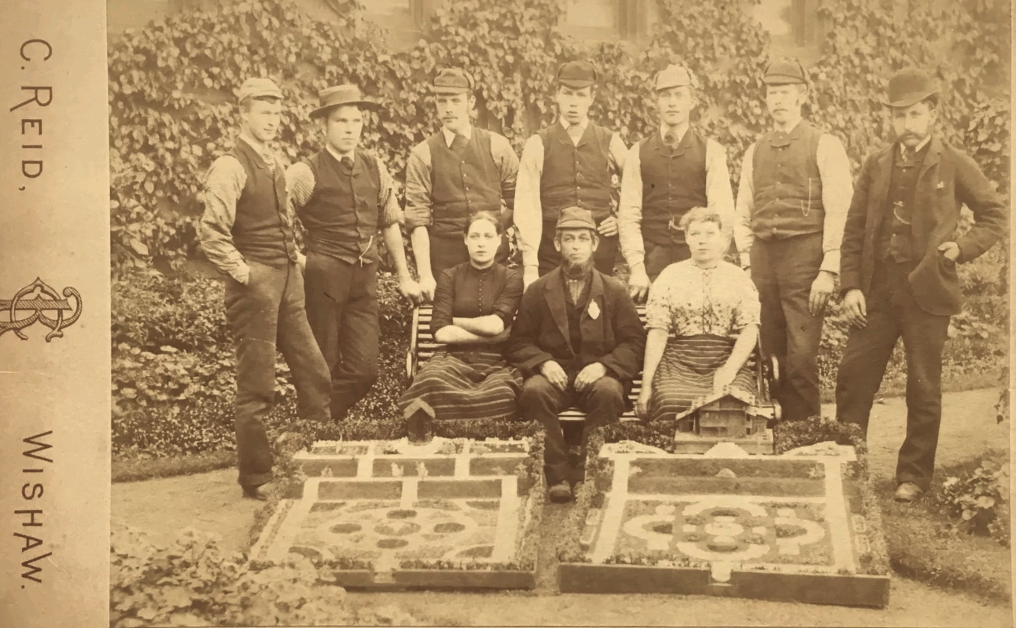 This looks like a group of garden/landscape design students with their miniature designs, late 1800's. Photo by Charles Reid of Wishaw.
