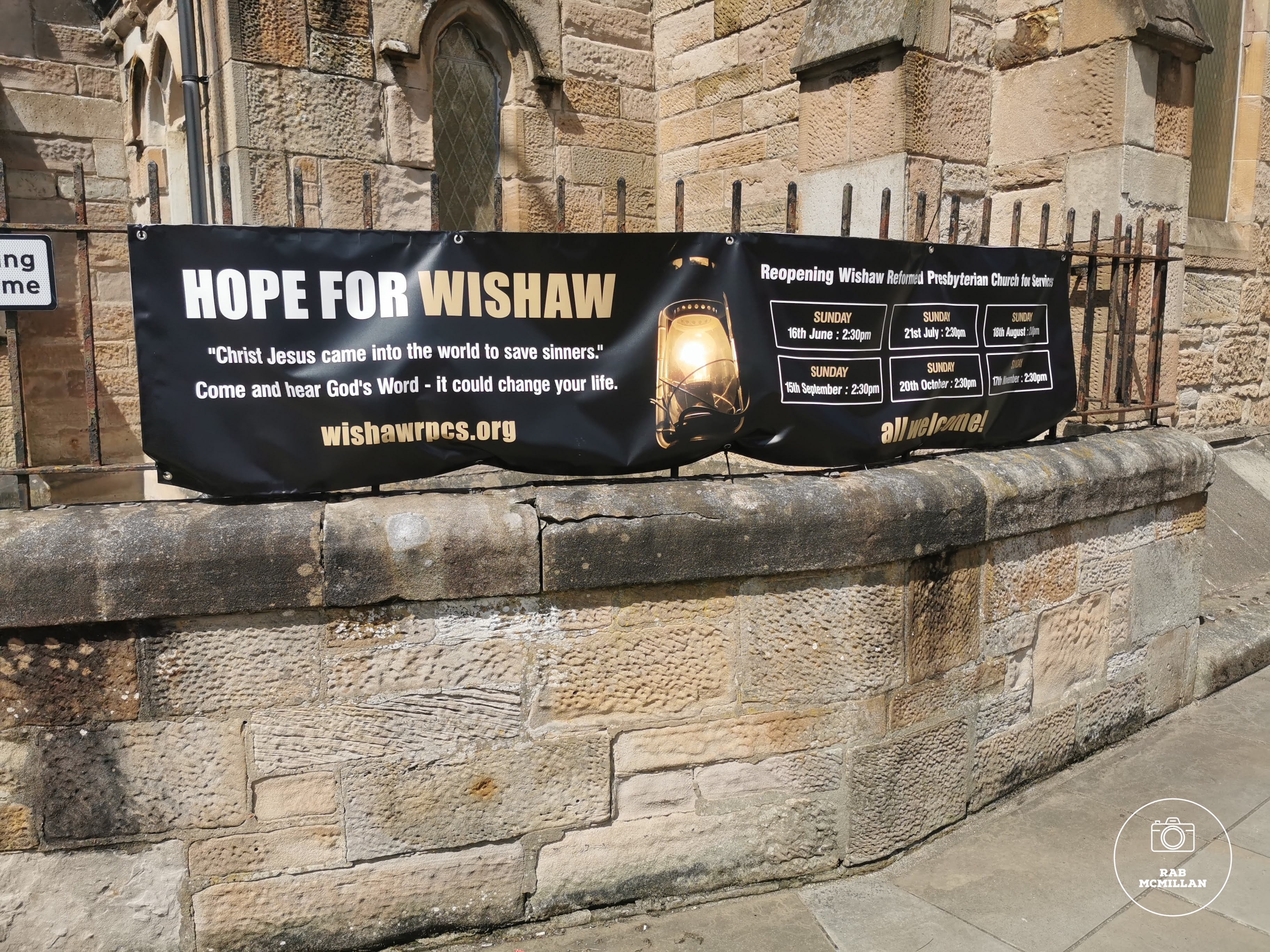 Banner on the wall of Wishaw Reformed Presbyterian Church, Kenilworth Avenue, 2024.
