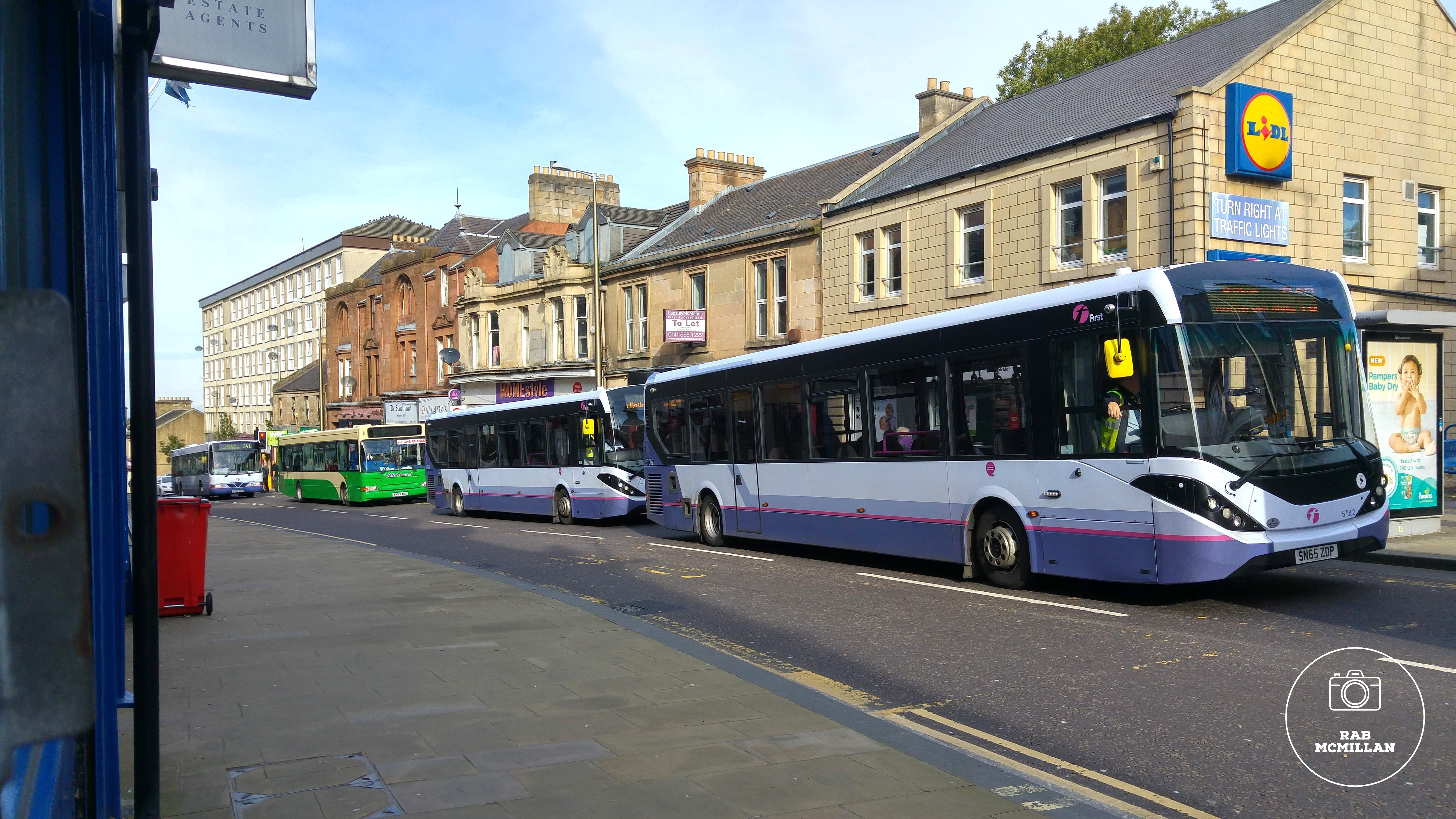 You wait ages on a bus then 4 come at the same time, Main Street, Wishaw, 2016.