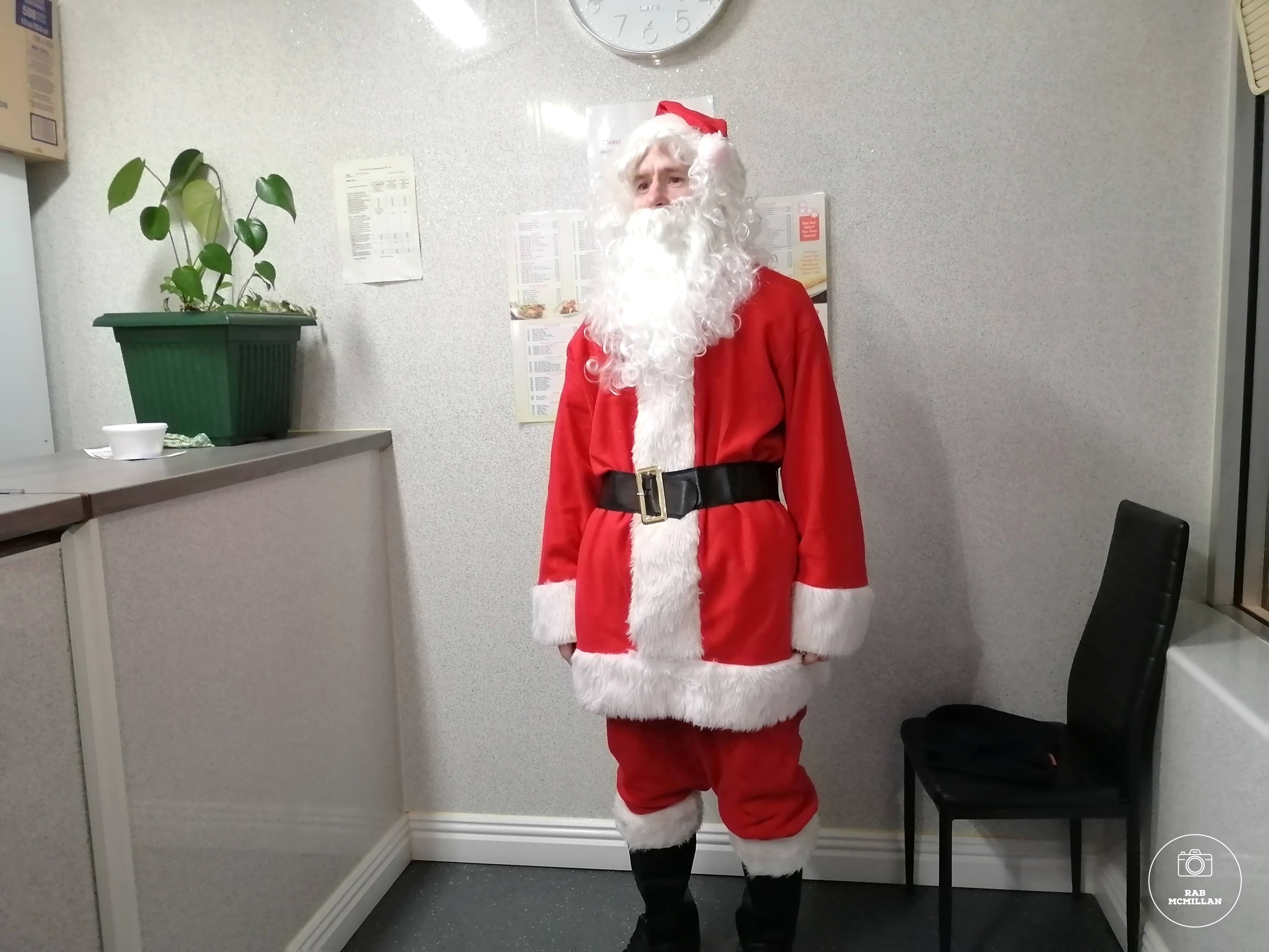 Santa in for a meal at Wing Lee, The Bield, Wishaw, Christmas Eve, 2020.