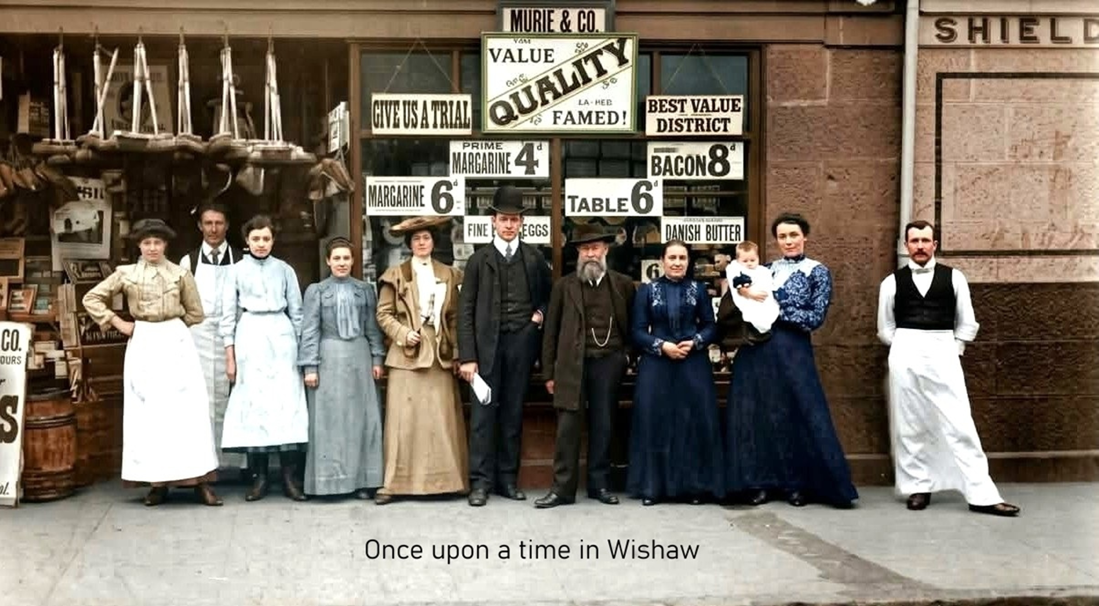 Murie and Co,, English Street, Craigneuk, Wishaw, early 1900's. The man on the right is the barman from the Shieldmuir Bar next door.