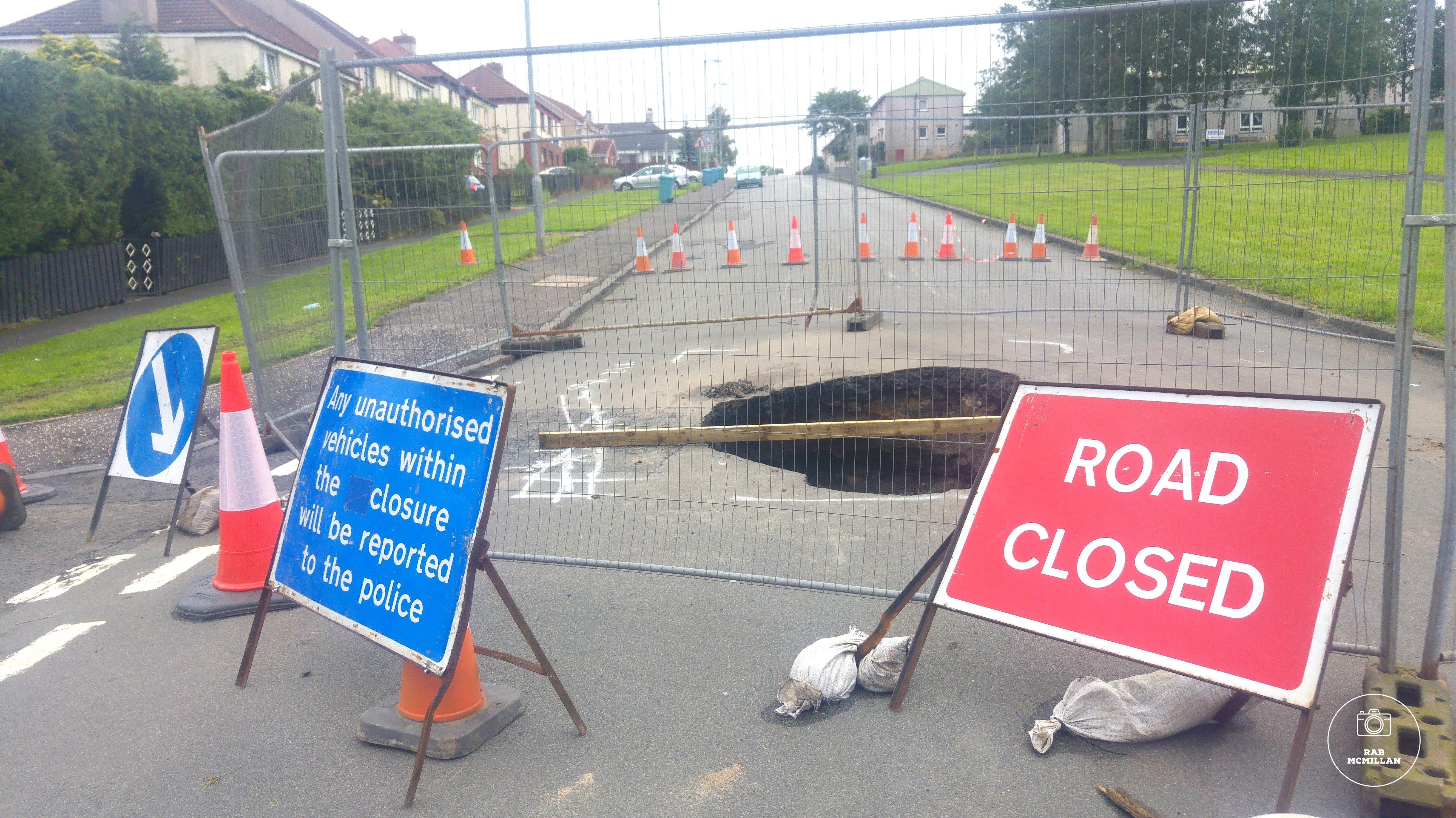 Sink hole appears on Greenhead Road, Wishaw, August, 2018.