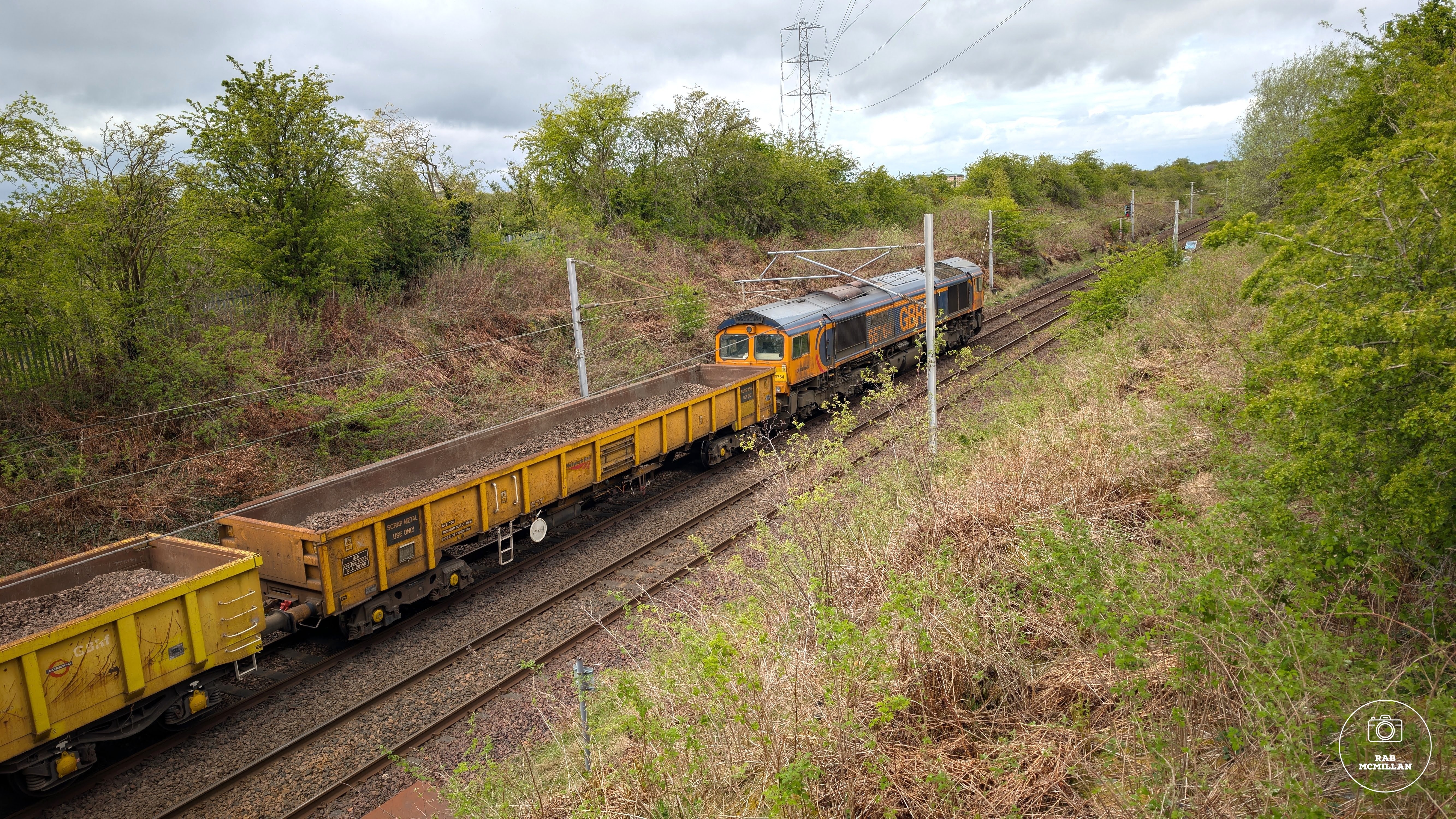 Goods train on the main line between Overtown and Pather, Wishaw, 2025.