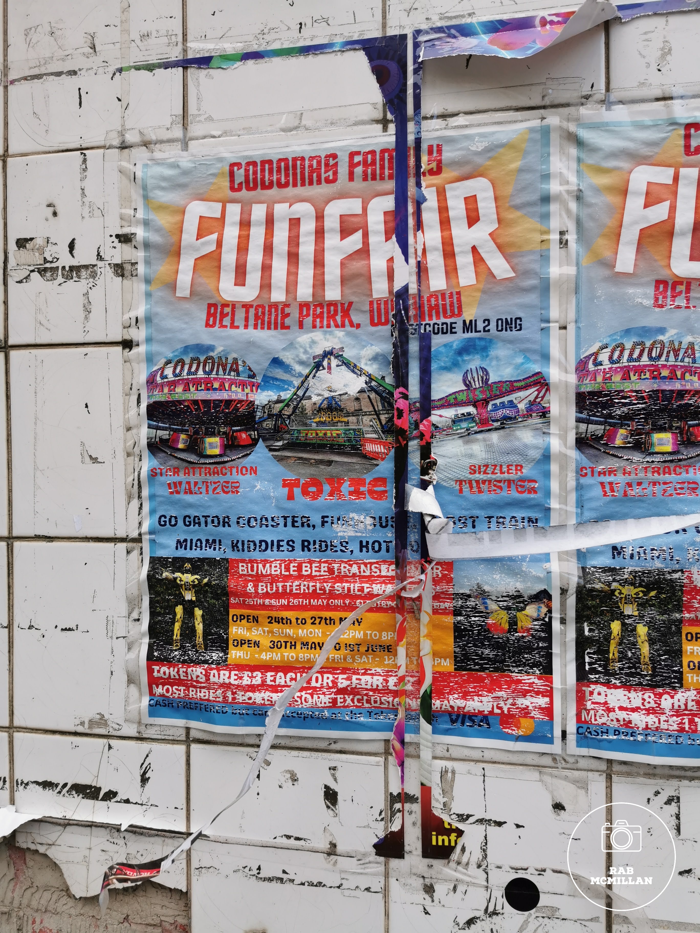 Codona Family Funfair posters, Main Street, Wishaw, 2024.