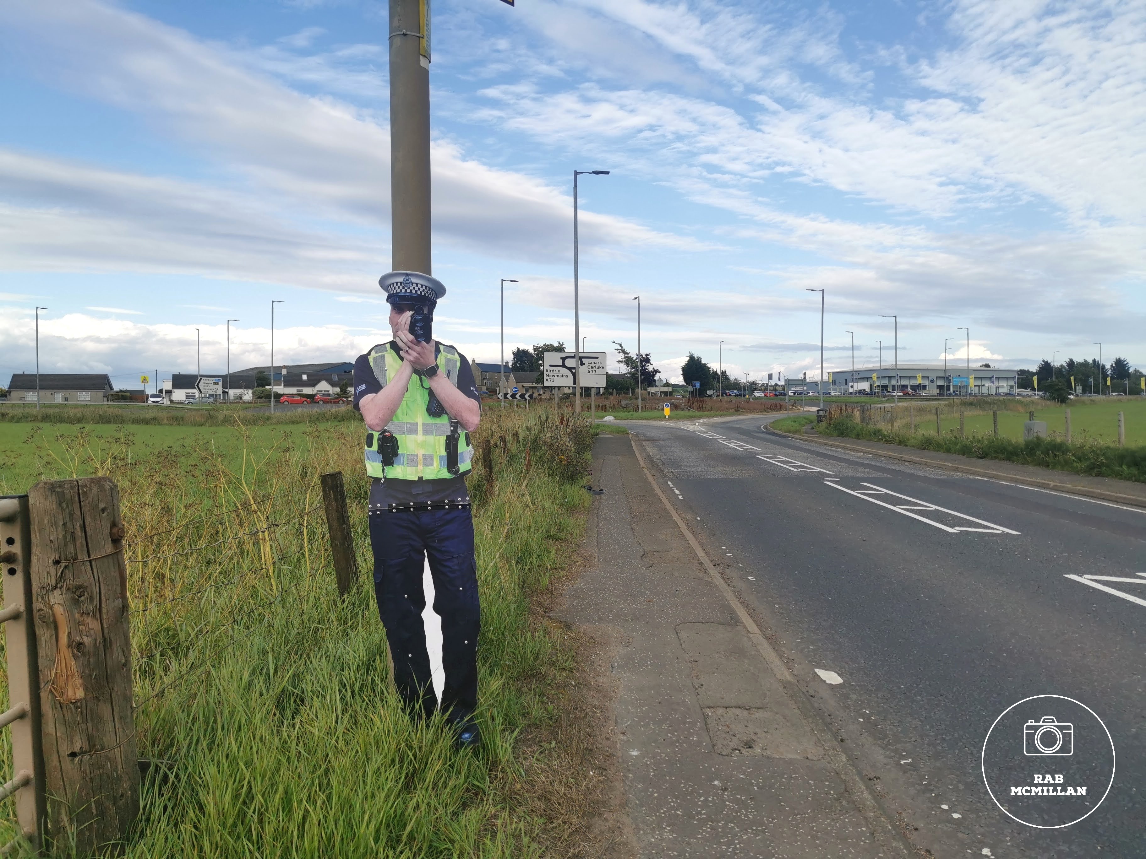 Cardboard Cutout Police Decoy, A721 between Waterloo and Bogside, Wishaw, 2023.