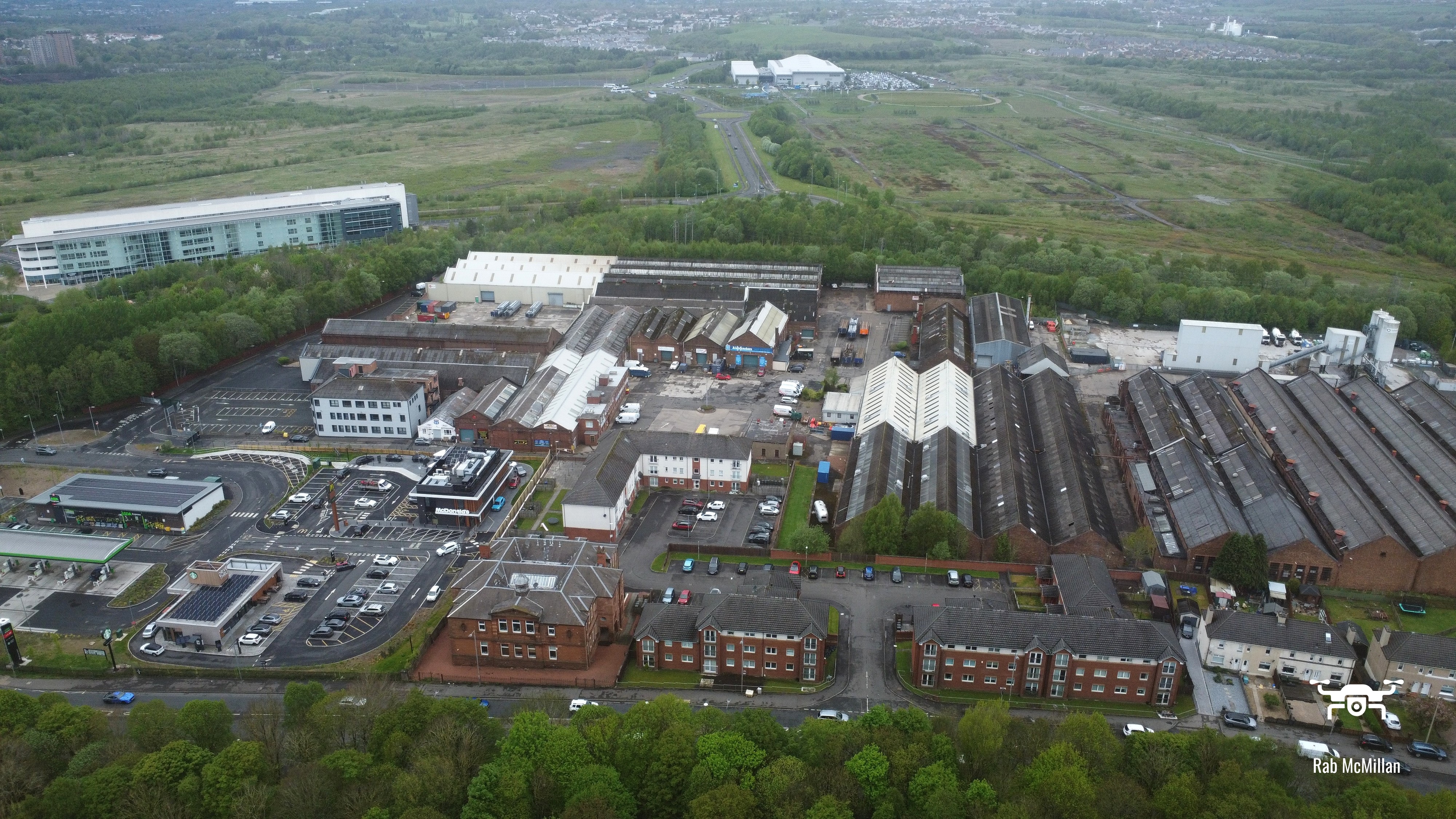 Craigneuk Public School on Beehive Brae, Anderson Boyes site looking to old Ravenscraig Steelworks site, between Wishaw and Motherwell, 2024.